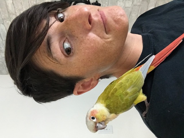 Katie with a parrot